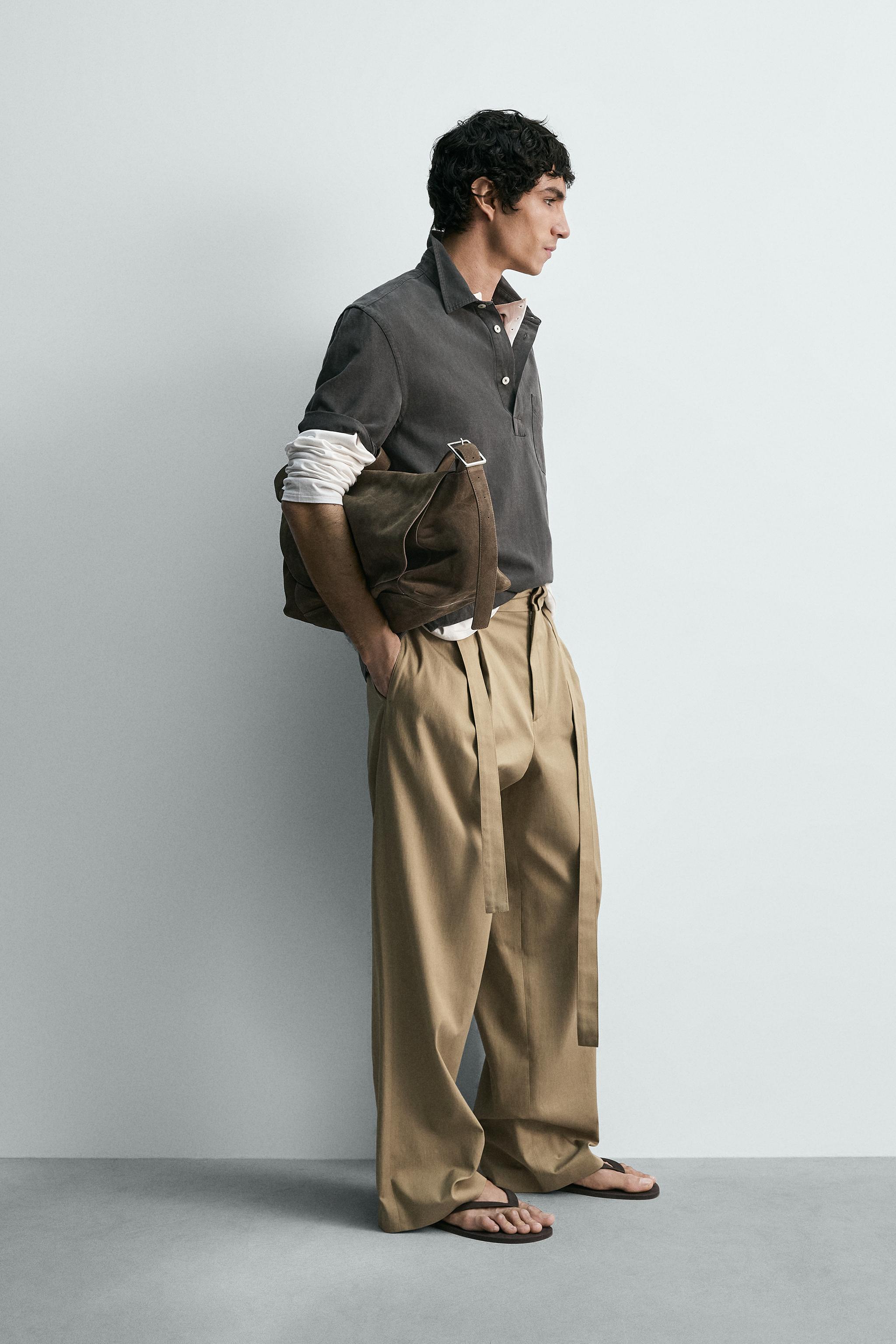FLOWY PLEATED BELTED PANTS